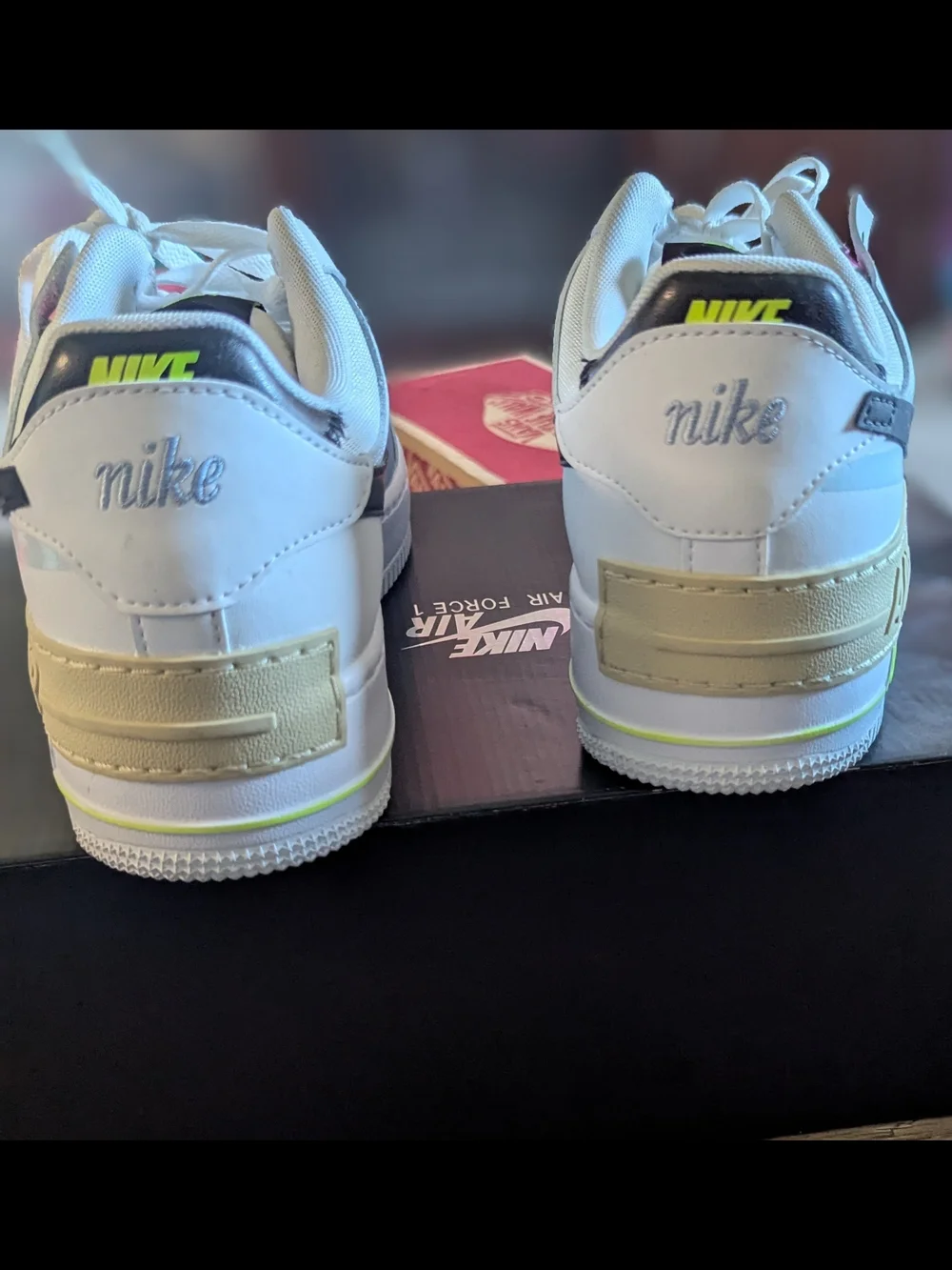 Nike women's White Sneakers with Black Swoosh and Pink Trim